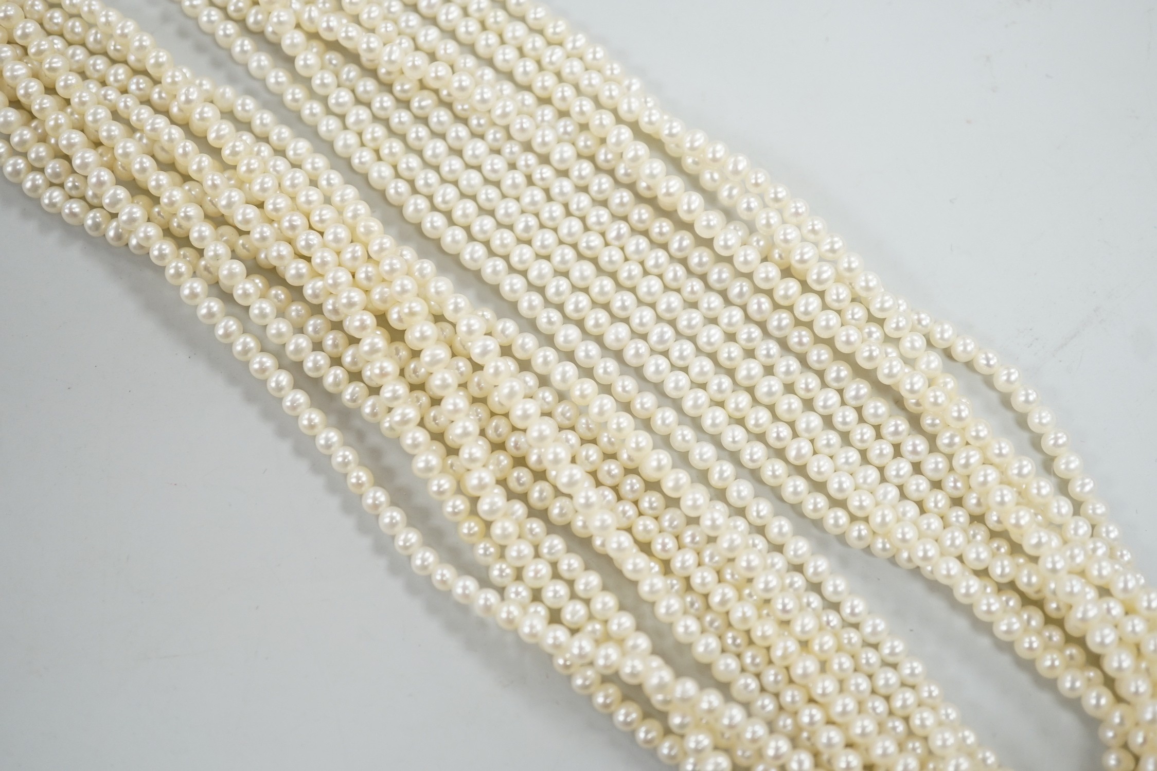 A modern multi strand cultured pearl necklace, with 925 clasp, 46cm.